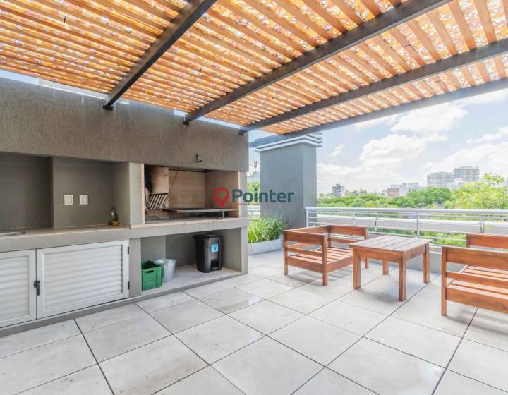 Venta apartamento de 2 dormitorios con cochera y terraza con parrillero propio en Malvin
