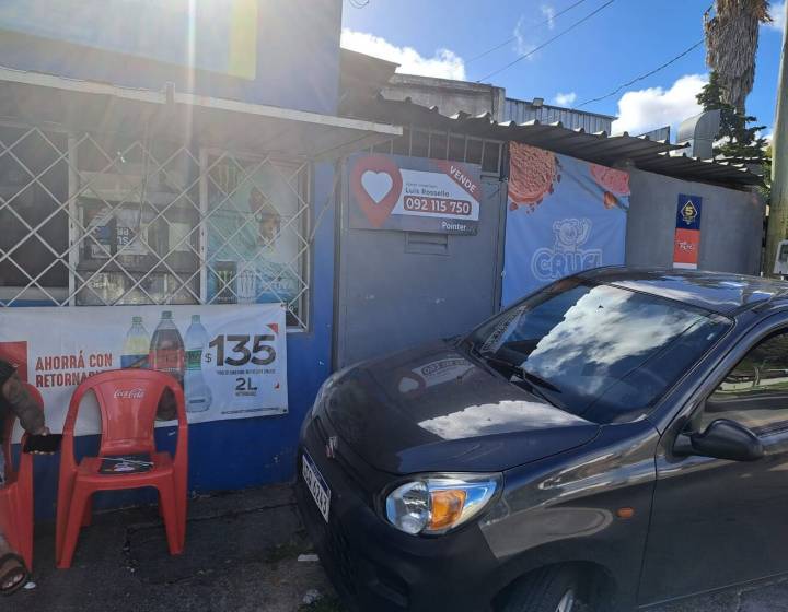 LOCAL Y GARAGE CON VIVIENDA SOBRE AVENIDA J.BELLONI A RECICLAR O DEMOLER.